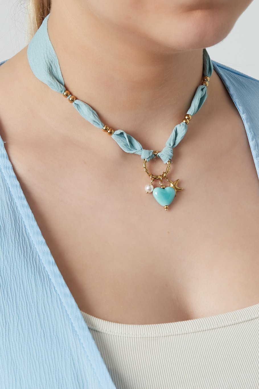 blauwe touwketting met bedels hart